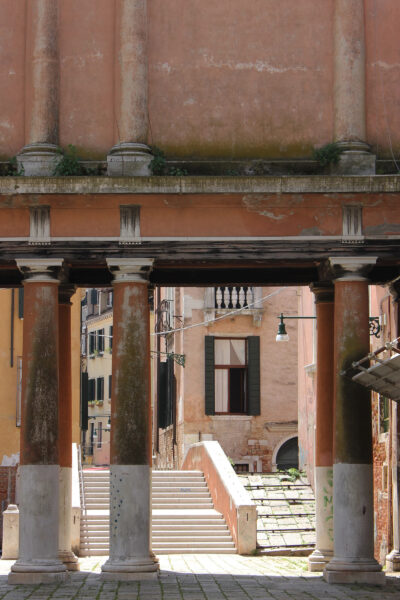 A building in Venice with several columns.