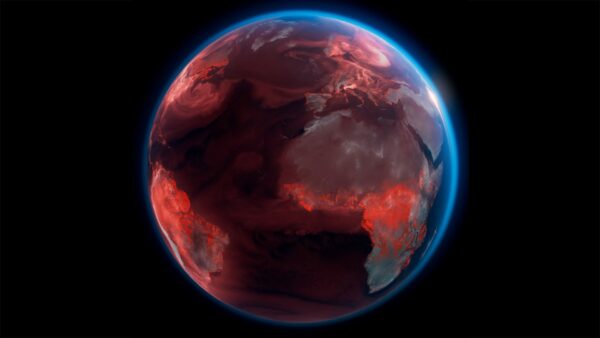 The globe, with a dark red mist over the countries and sea.