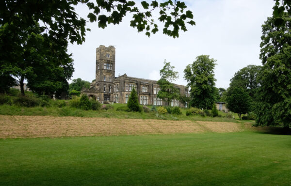 An old stately home surrounded by parkland