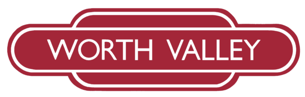 Keighley and Worth Valley railway logo - a deep red plaque with white writing: WORTH VALLEY