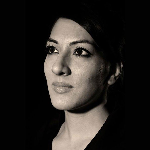 A black and white portrait of Saima Mir