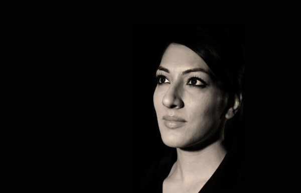 A black and white portrait of Saima Mir