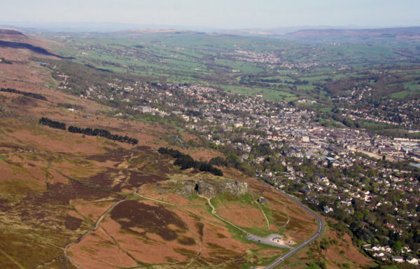 An aerial shot of Ilkley Moor with the town of Ilkley in the background