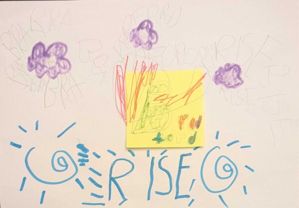 Childrens drawing of three purple flowers, and a yellow sticky note in the middle saying Bradford, and Rise written underneath