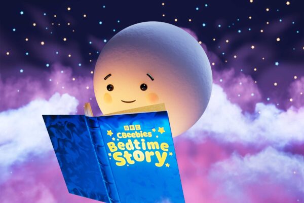 A smiling moon against a purple sky reads a book which says CBeebies Bedtime Story on the front cover