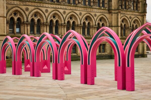 Wide angle of The Ramadan Pavilion, showcasing the arches of the structure. Sat in front of Bradford's City Hall.