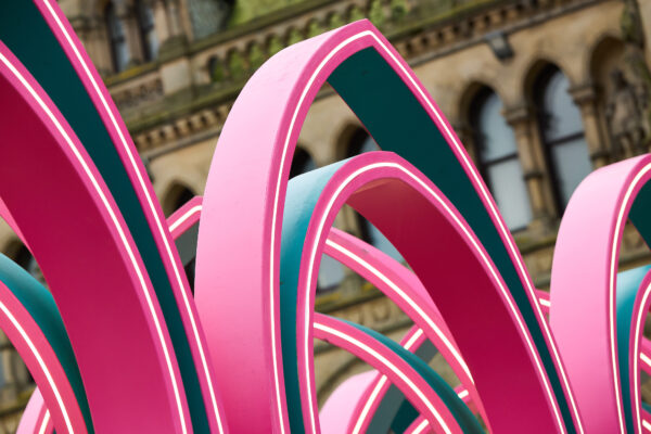 Close up image of The Ramadan Pavilion, showcasing the pink arches of the structure.