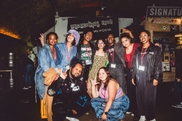 A group of people pose for the camera