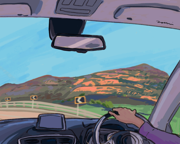 Drawing from a car window, with mountains in the distance