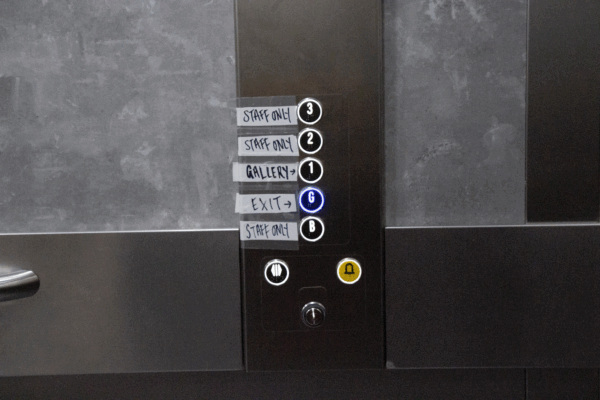 Lift at loading bay. Buttons for the different levels, with the ground floor/ exit button lit up
