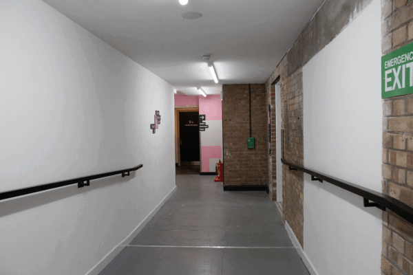 Hallway walk down to Loading Bay toilets