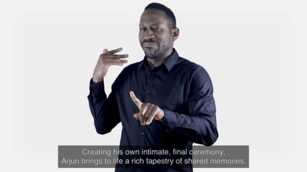 A still image of a BSL interpreter.