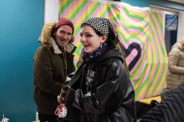 Young girl and man smiling