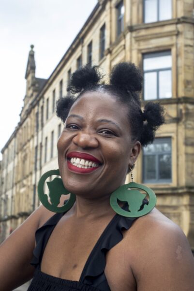 Mery Katola-Phiri, radio presenter smiling outside