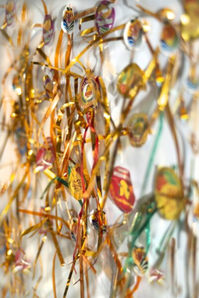 Stickers and tinsel from Pakistani mangos stuck to a fridge door in Bradford. Photo by Tim Smith.