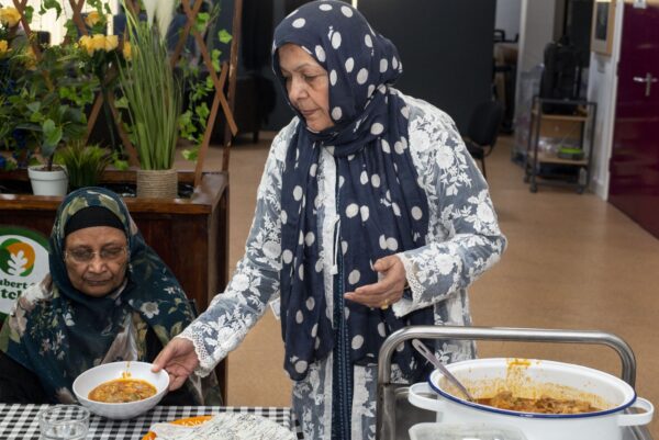 Staff and members of Womenzone, a community centre just off Leeds Road in Bradford. These photos show typical everyday activites such as exercise classes, socialising, cooking and the sharing of a meal. Photos by Tim Smith.