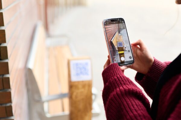 Someone scanning a QR code with their phone