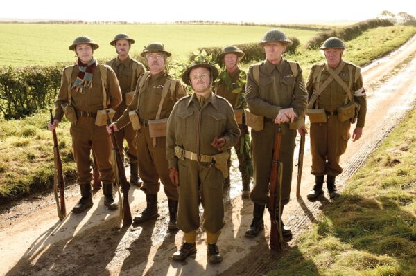 dads army cast, men all posing in war army uniform