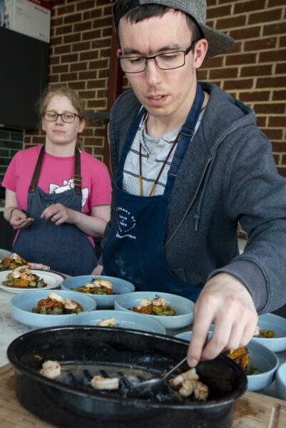 Rebecca and Joe, right.People harvesting food from the allotments at NEET (the Northcliffe Environmental Enterprise Team) in Northcliffe Park, where they meet several times a week. They then prepare what tehy have picked to make a lunch which they share. Photo by Tim Smith.