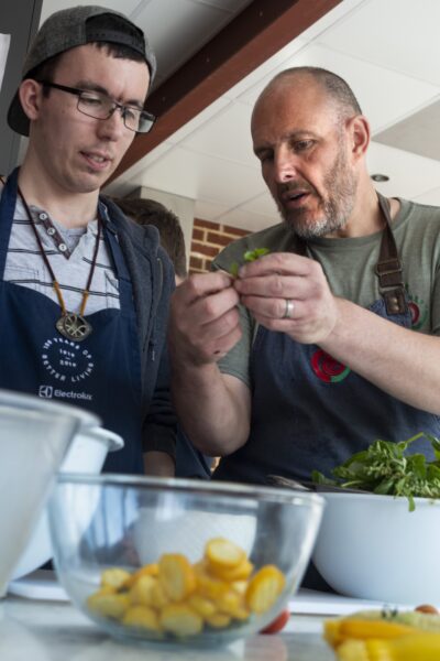 Joe, left, and Richard, right.People harvesting food from the allotments at NEET (the Northcliffe Environmental Enterprise Team) in Northcliffe Park, where they meet several times a week. They then prepare what tehy have picked to make a lunch which they share. Photo by Tim Smith.