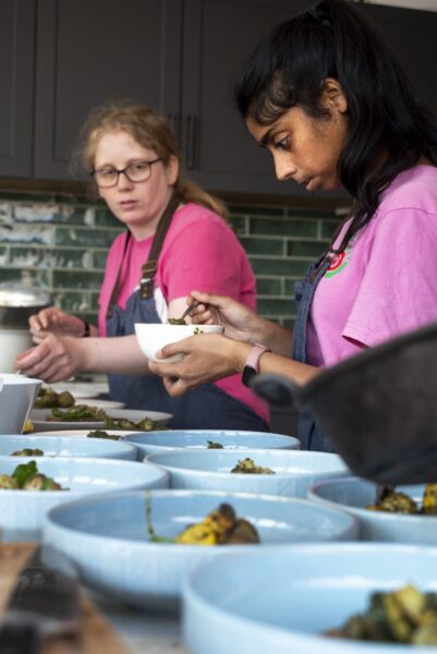 Rebecca and Ajeema, right.People harvesting food from the allotments at NEET (the Northcliffe Environmental Enterprise Team) in Northcliffe Park, where they meet several times a week. They then prepare what tehy have picked to make a lunch which they share. Photo by Tim Smith.