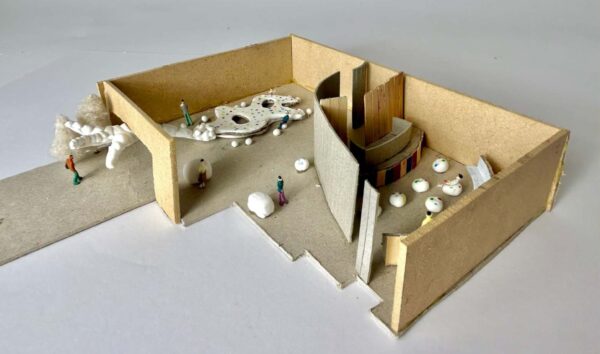 Wooden model of a building - showing different spaces for different purposes