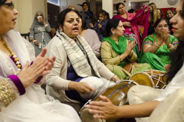 A song and dance session organised as part of the Loving Grannies' Music project at Womenzone community centre. Photos by Tim Smith.