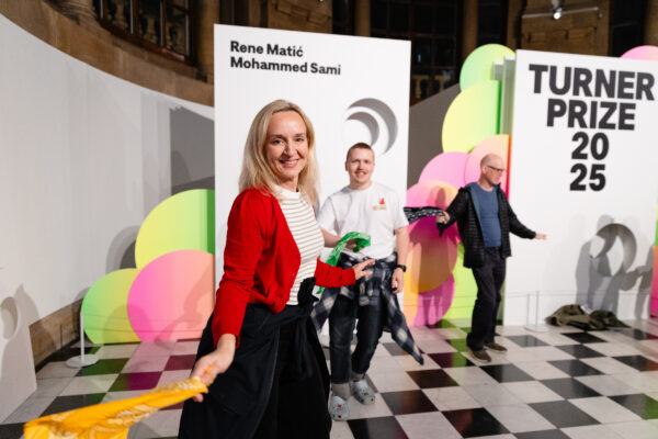 People smiling in Cartwright Hall Art Gallery