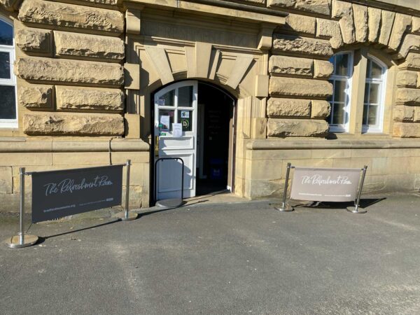 A white doorway to the cafe at Cartwright Hall Art Gallery.