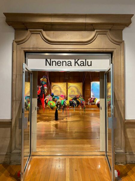 A large doorway with Nnena Kalu written above it.