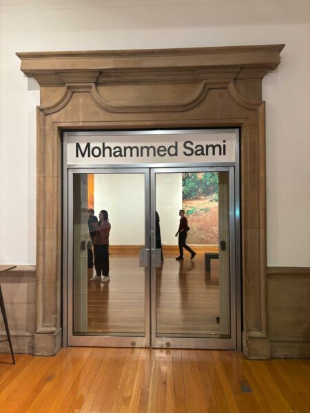A large door with Mohammed Sami written above it.