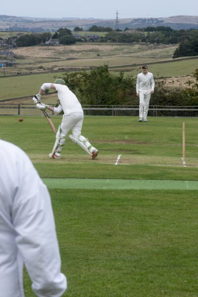 Denholme vs Haworth 1st teams playing each other at Denholme Cricket Club in the Second Division of the Craven & District Cricket League, a league in which many of the Bradford District teams play. Photos by Tim Smith.
