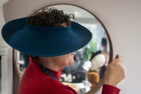 Making hats at the JBH Millenery School in Addingham. The classses are run by Justine Bradley-Hill who has 30 experience in the industry. She makes hats in a millenery studio in her garden, and sells her one-off designs to customers world wide.