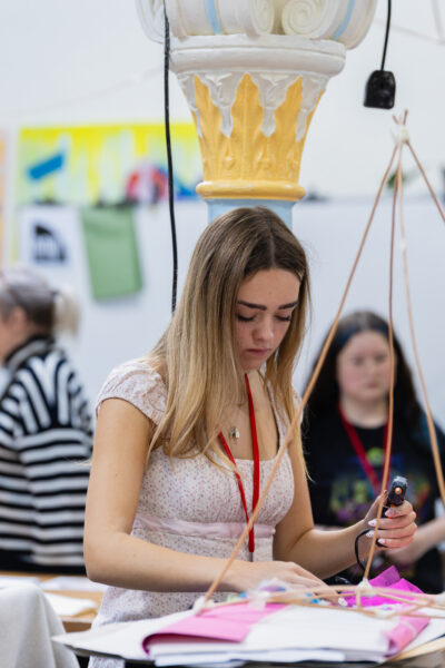 College student engaging in arts and crafts