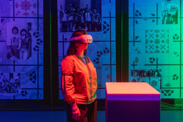 A young person with a VR headset on.