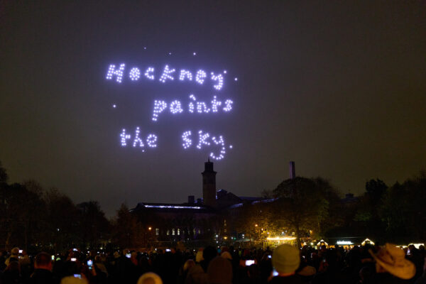 Drones in the sky above Saltaire spell out 'Hockney paints the sky'.