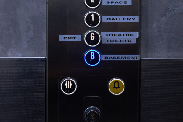 Buttons in the lift of Loading Bay, with the basement button glowing blue.