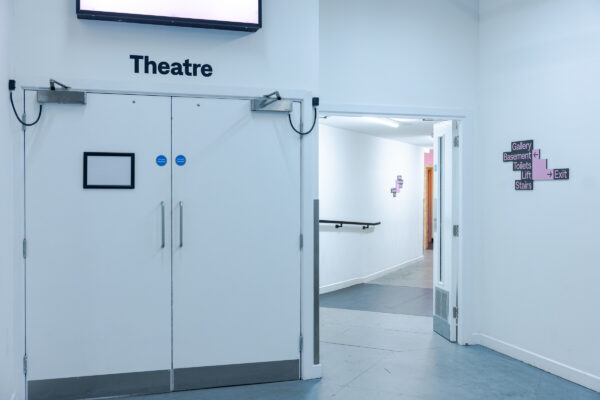 Entrance inside of Loading Bay, with theatre double door entrance