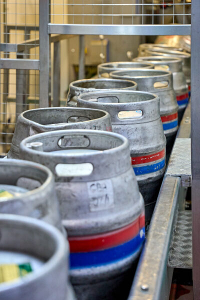 Caskets of beer on a factory line.