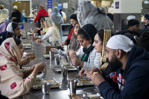 The Guru Gobind Singh Gurdwara on Gobind Marg in central Bradford. Alongside the prayer hall is the langar, or community kitchen, which serves vegetarian meals to all free of charge. The kitchen, a central feature of all Gurdwaras, is run by Sikh community volunteers who are doing seva, or 