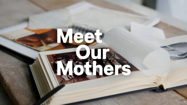 An open recipe book with the words Meet Our Mothers across the screen